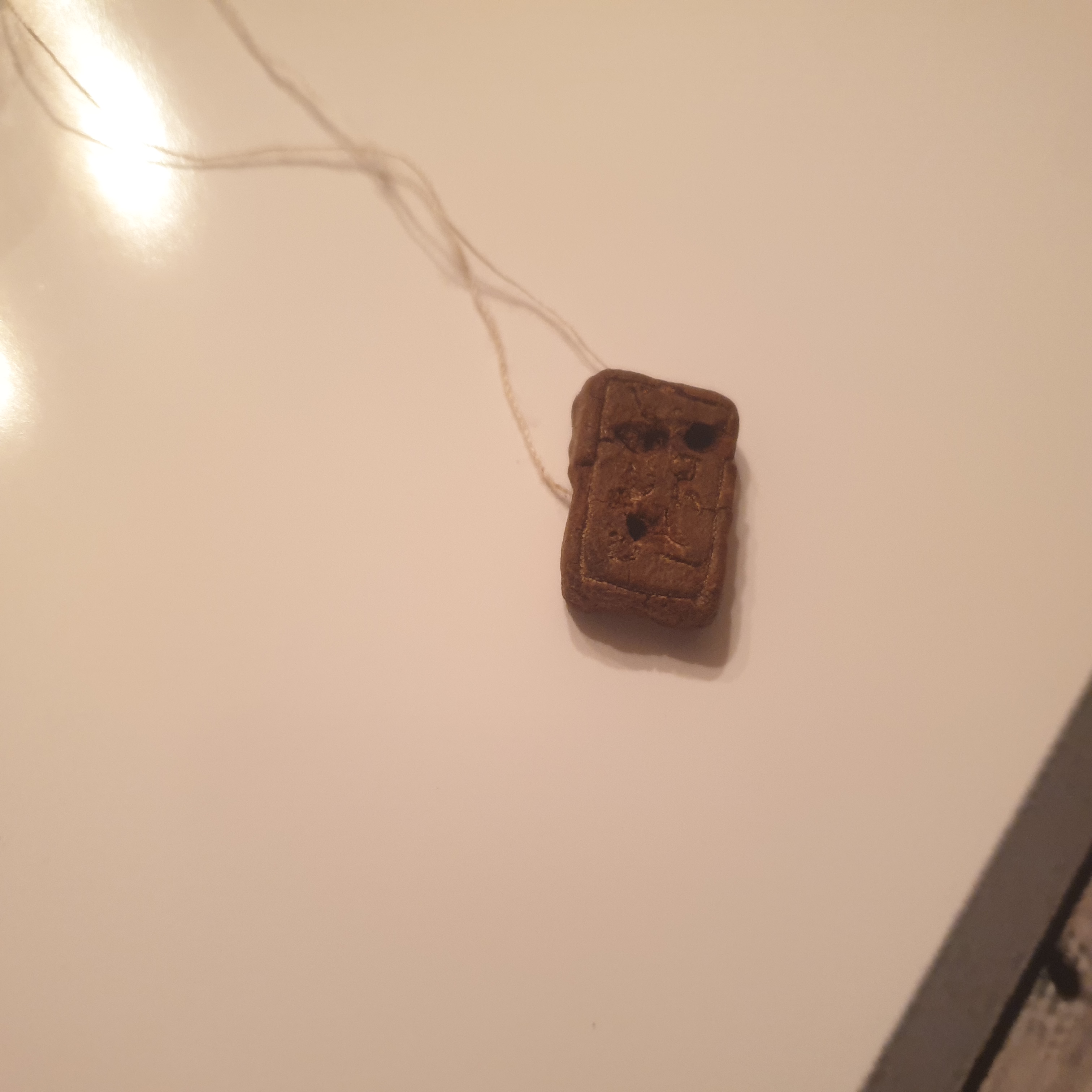 Qundy belginiń qupııasy